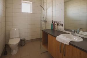 Koupelna v ubytování Framtid Apartments and Holiday Homes + 34 fotografií