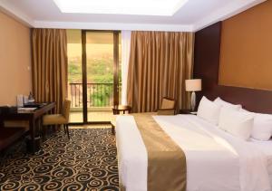 Cama o camas de una habitación en Bela International Hotel & ConventionTernate