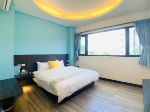 Cama o camas de una habitación en 旭語民宿 台東縣民宿1436號