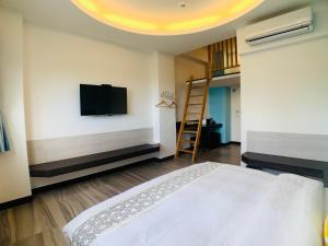 Cama o camas de una habitación en 旭語民宿 台東縣民宿1436號