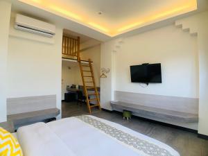 Cama o camas de una habitación en 旭語民宿 台東縣民宿1436號
