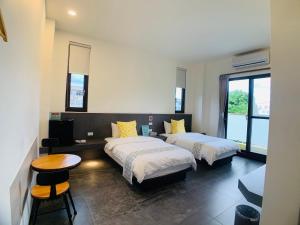 Cama o camas de una habitación en 旭語民宿 台東縣民宿1436號