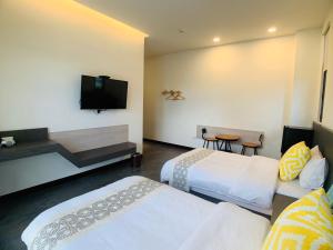 Cama o camas de una habitación en 旭語民宿 台東縣民宿1436號