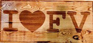 a wooden box with a heart painted on it at Villa Shepherd Lajares - LUXURY VILLA FUERTEVENTURA in Lajares