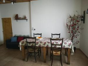 A seating area at Etna, salvia e rosmarino