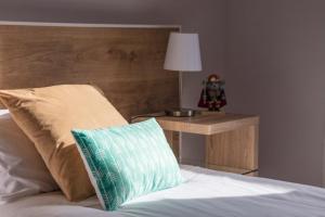 Katil atau katil-katil dalam bilik di Acogedor Apartamento Baqueira 1500