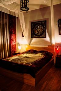Postel nebo postele na pokoji v ubytování Dharma Luxury & Spa Apartment