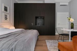 Posteľ alebo postele v izbe v ubytovaní Bumblebee Luxury Apartments