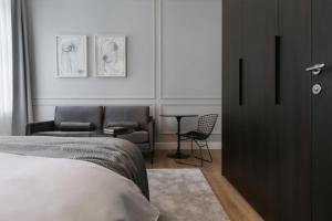 Posteľ alebo postele v izbe v ubytovaní Bumblebee Luxury Apartments