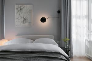Posteľ alebo postele v izbe v ubytovaní Bumblebee Luxury Apartments