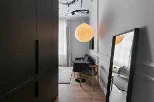 Televízia a/alebo spoločenská miestnosť v ubytovaní Bumblebee Luxury Apartments