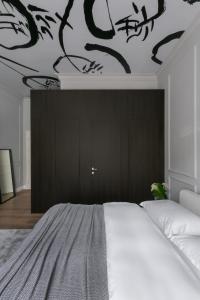 Posteľ alebo postele v izbe v ubytovaní Bumblebee Luxury Apartments