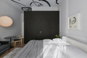 Posteľ alebo postele v izbe v ubytovaní Bumblebee Luxury Apartments