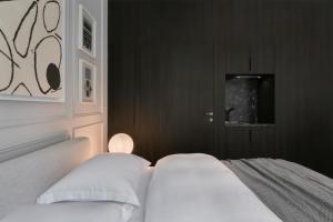Posteľ alebo postele v izbe v ubytovaní Bumblebee Luxury Apartments