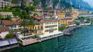 an aerial view of a town next to the water at CASA MARTINELLI in Limone sul Garda