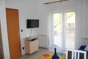 Televizorius ir (arba) pramogų centras apgyvendinimo įstaigoje Apartment Anna Zagreb