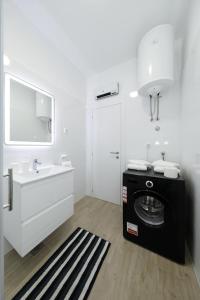 Kúpeľňa v ubytovaní Idassa bridge apartments + 32 fotografií