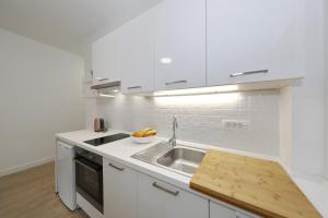 Kuchyňa alebo kuchynka v ubytovaní Idassa bridge apartments