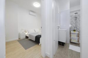 Posteľ alebo postele v izbe v ubytovaní Idassa bridge apartments