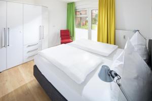 Cama o camas de una habitación en Appartement Haus Bracht- direkt am Kurplatz