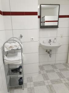 Ванна кімната в KM Apartment