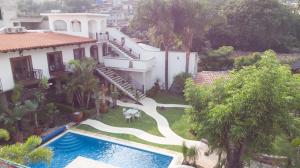 Bazén v ubytování Hotel Concierge Flor y Canto nebo v jeho okolí
