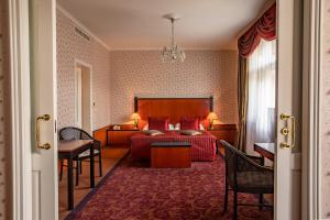Posteľ alebo postele v izbe v ubytovaní Grandhotel Pupp