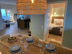 Postel nebo postele na pokoji v ubytování COAST HOUSE Sky Suite