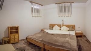 מיטה או מיטות בחדר ב-Ferienwohnung Maric