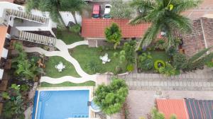 Bazén v ubytování Hotel Concierge Flor y Canto nebo v jeho okolí