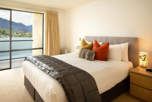 Un pat sau paturi într-o cameră la Villa Del Lago