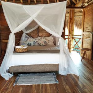 Postel nebo postele na pokoji v ubytování Paraíso Natural Ecohotel