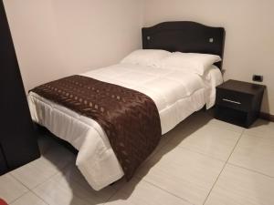 Hotel LB - Los Balsos客房内的一张或多张床位