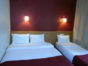 Postel nebo postele na pokoji v ubytování Cetinkaya Hotel