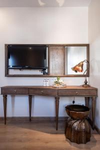 TV a/nebo společenská místnost v ubytování Sanouva Saigon Hotel