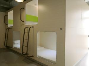 Palanda nebo palandy na pokoji v ubytování 深圳栖游青年旅馆Shenzhen Xi You Hostel