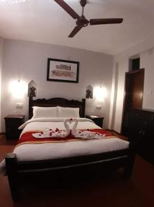 A bed or beds in a room at The Hotel
