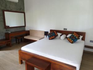 Postel nebo postele na pokoji v ubytování Villa Goodwill Paradise