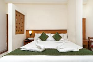 מיטה או מיטות בחדר ב-Le Celestium