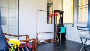 Posezení v ubytování Sabina Guesthouse Kamala