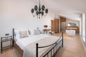 Letto o letti in una camera di Villa Basca