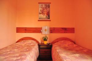 Postel nebo postele na pokoji v ubytování Guesthouse Leiputrija
