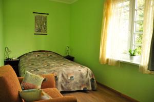 Postel nebo postele na pokoji v ubytování Guesthouse Leiputrija