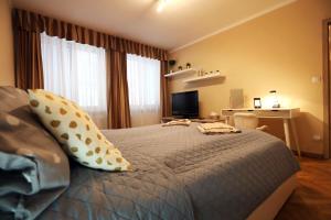Posteľ alebo postele v izbe v ubytovaní Old Town Apartment