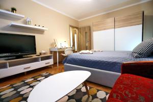 Posteľ alebo postele v izbe v ubytovaní Old Town Apartment
