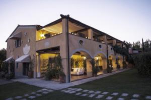 a large building with a bed inside of it at Tenuta i Massini in Empoli