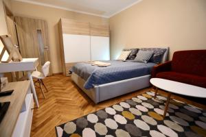 Posteľ alebo postele v izbe v ubytovaní Old Town Apartment