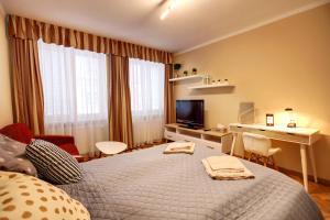 Posteľ alebo postele v izbe v ubytovaní Old Town Apartment