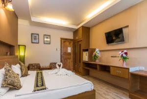 Cama o camas de una habitación en Hotel Romeo Palace Pattaya