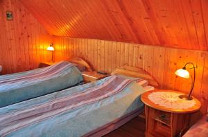 Katil atau katil-katil dalam bilik di Guesthouse Leiputrija